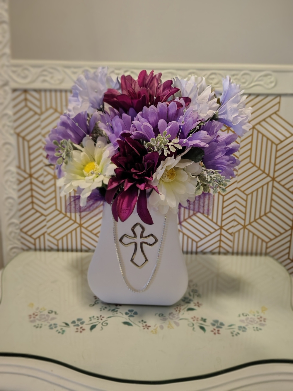 White Cross Vase with Purple and White Floral Arrangement